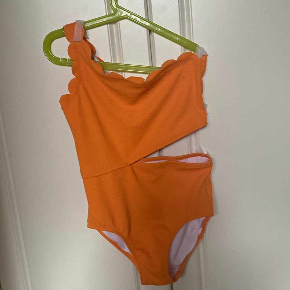 GIRLS SIZE L ONE PIECE BATHING SUIT .